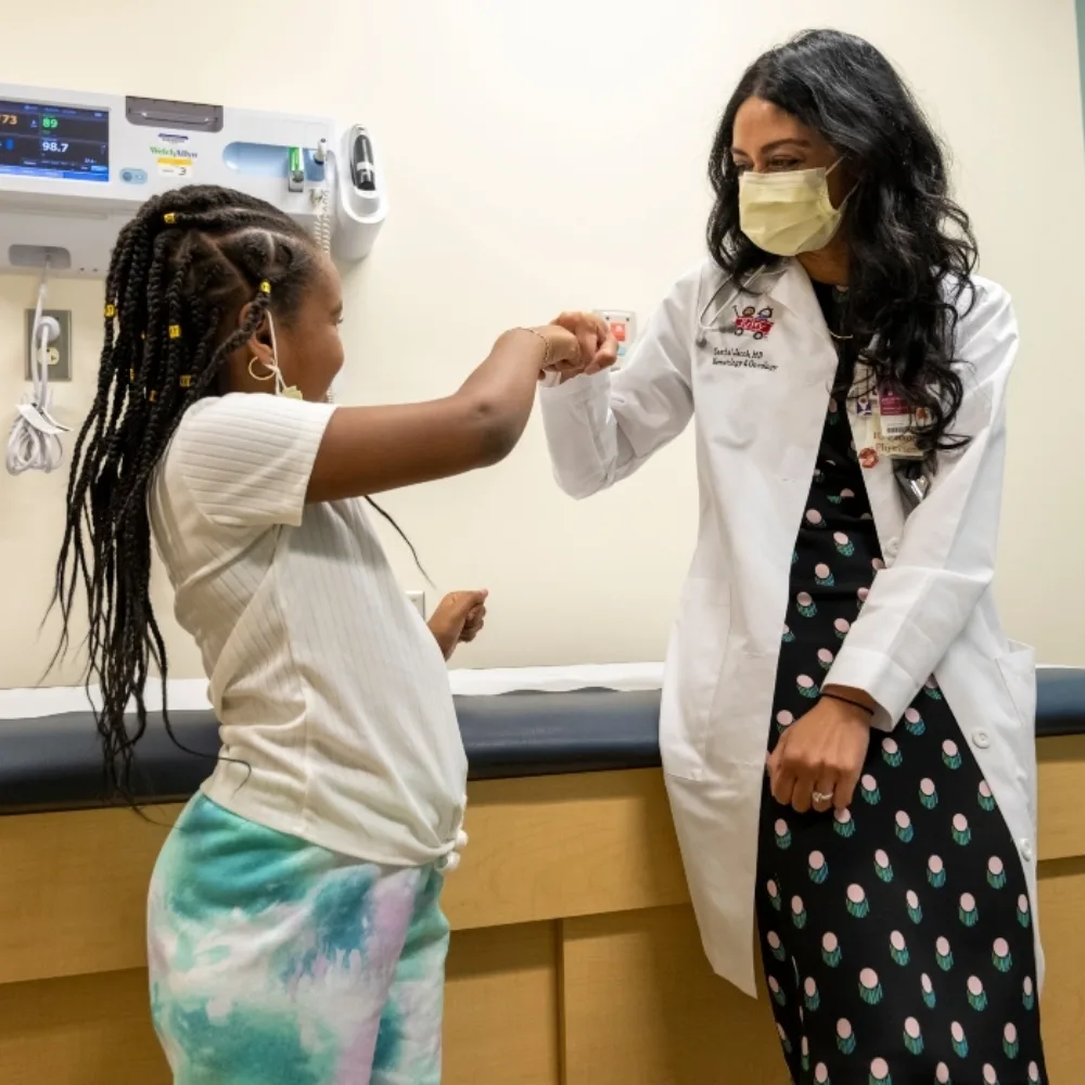 Calina Jones-McKinzie with doctor