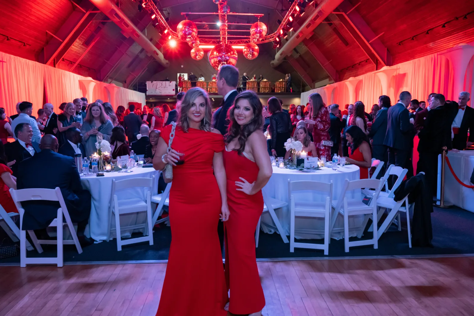 Two woman posing for photo at Riley Red event