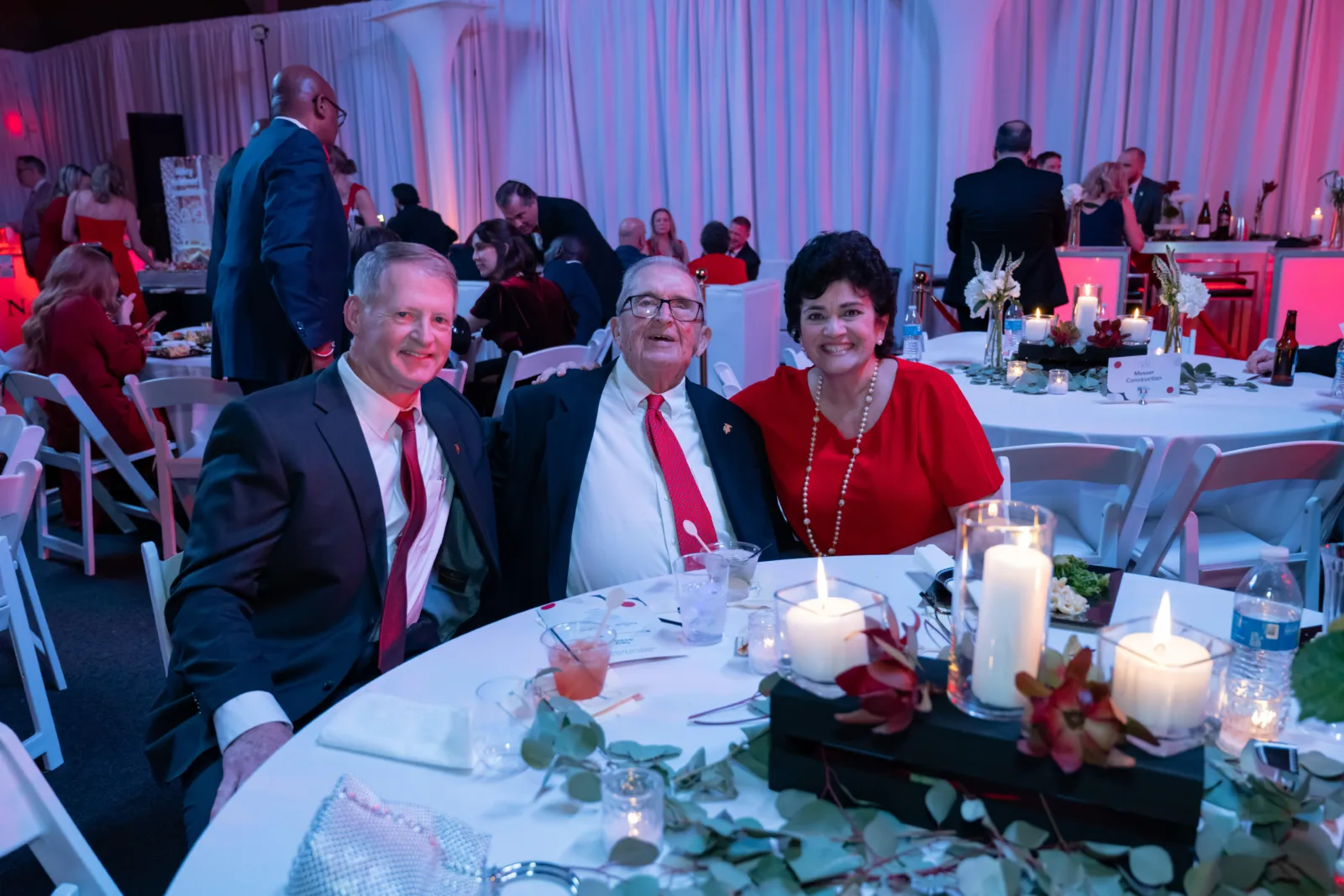Liz Elkas sitting with supporters at Riley Red event