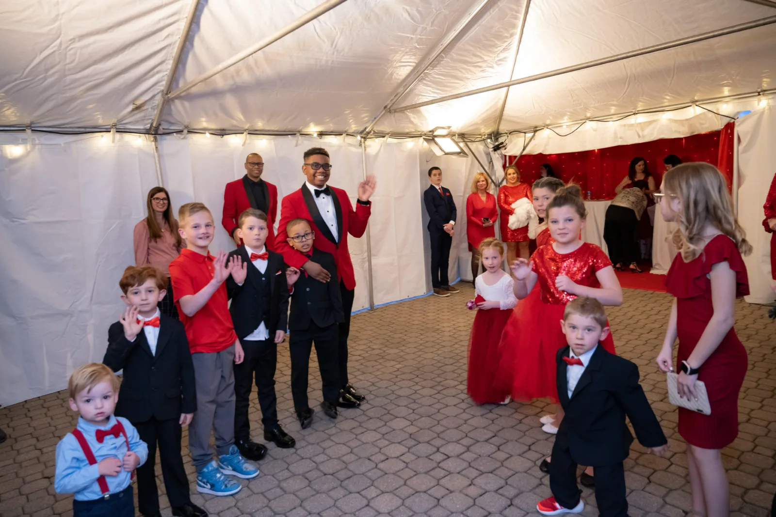 Riley kids greeting guests at the Riley Red event