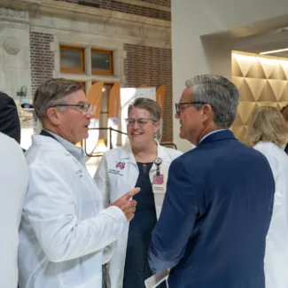 Walther Cancer Foundation event interaction with guest and researchers
