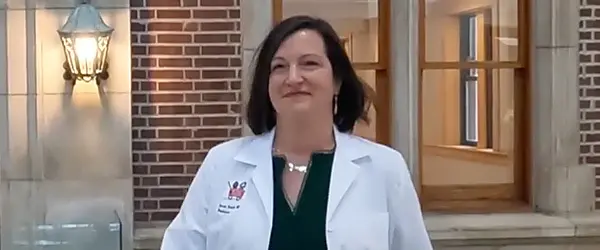 Dr. Bosslet portrait photo in front of hospital.