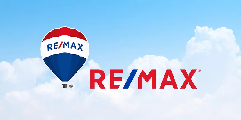 REMAX  logo with hot air balloon with clouds in the background