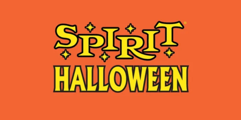 An orange rectangle with yellow letters that say Spirit Halloween